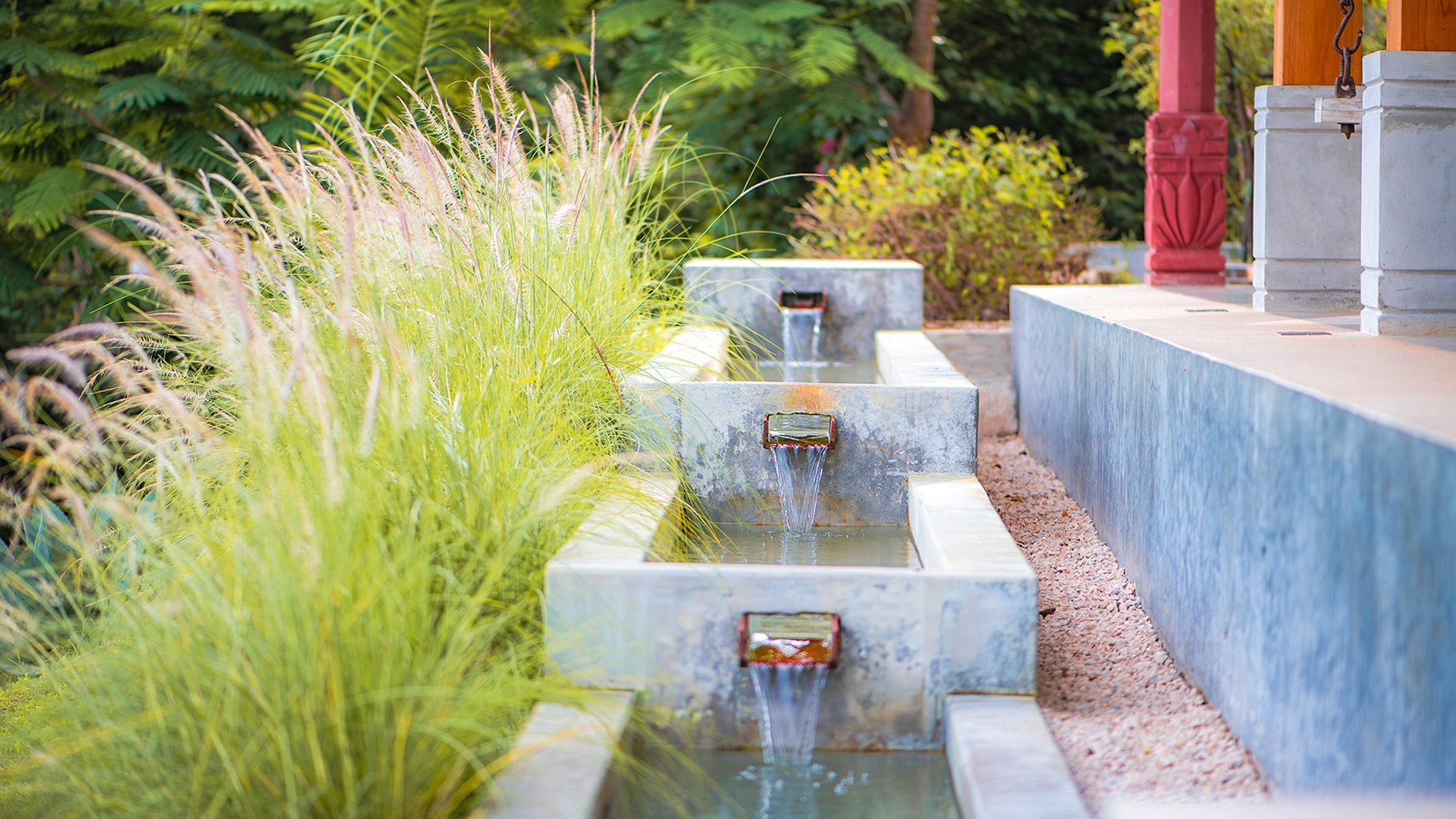 A tiered water feature Dandapani designed, water falling between basins