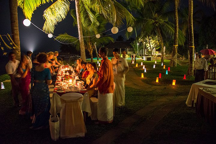 The venue was beautifully decorated with lights, flowers, parade umbrellas and a traditional house boat parked next to us to complete the setting. 