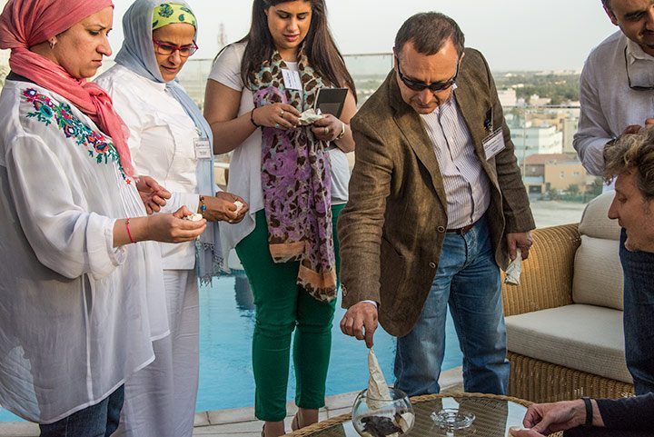 Attendees light on fire their negative and burdensome emotions, thus symbolically the self. 