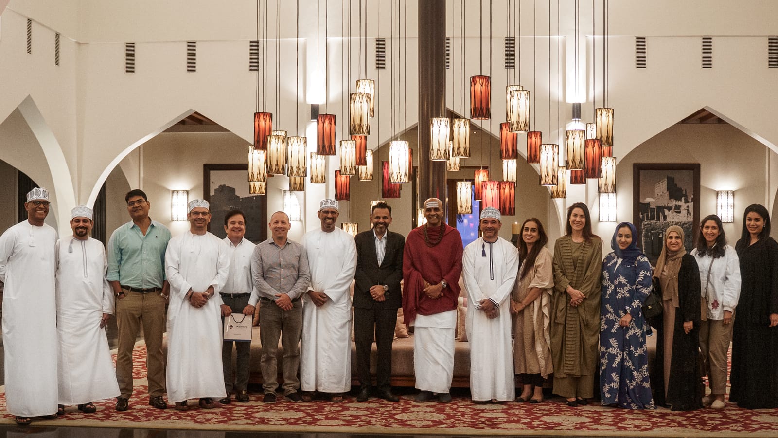 Dandapani delivering a keynote on stage in Muscat, Oman