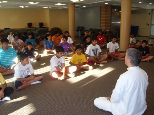 The group is divided into two - boys and girls. Easan and Dandapani take turns teaching each group, alternating every day. After hatha yoga is our morning meditation session.