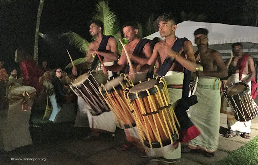 Traditional Kerala drummers, Singari Melam, sailed in on boats across the lake and performed for our group.
