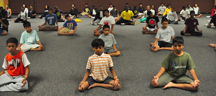Hindu youth doing yoga and meditation