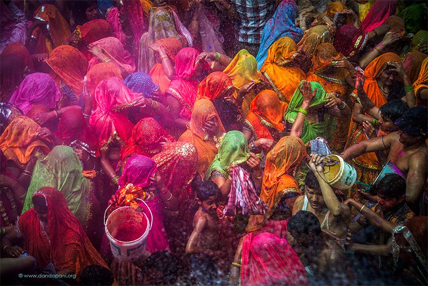 Ladies covered in color and water at the Holi Festival of Colors in Baldeo, North India.