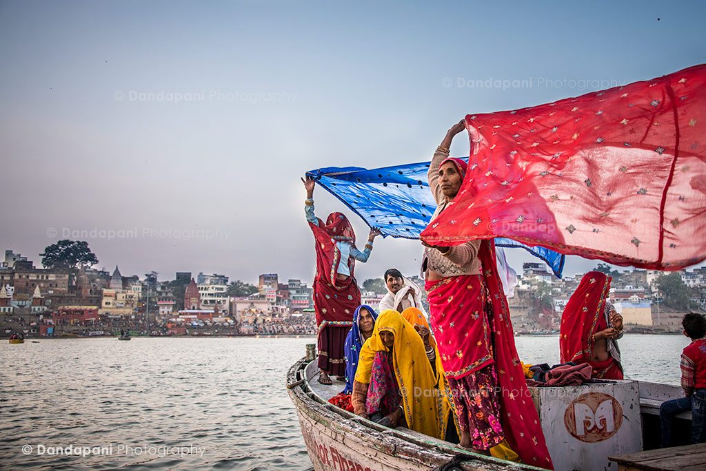 These women are drying their saris by holding them up in the wind after having taken a dip in the holy Ganges river in the town of Varanasi, North India. I waited patiently in a boat nearby for over 20 minutes for this one shot. 