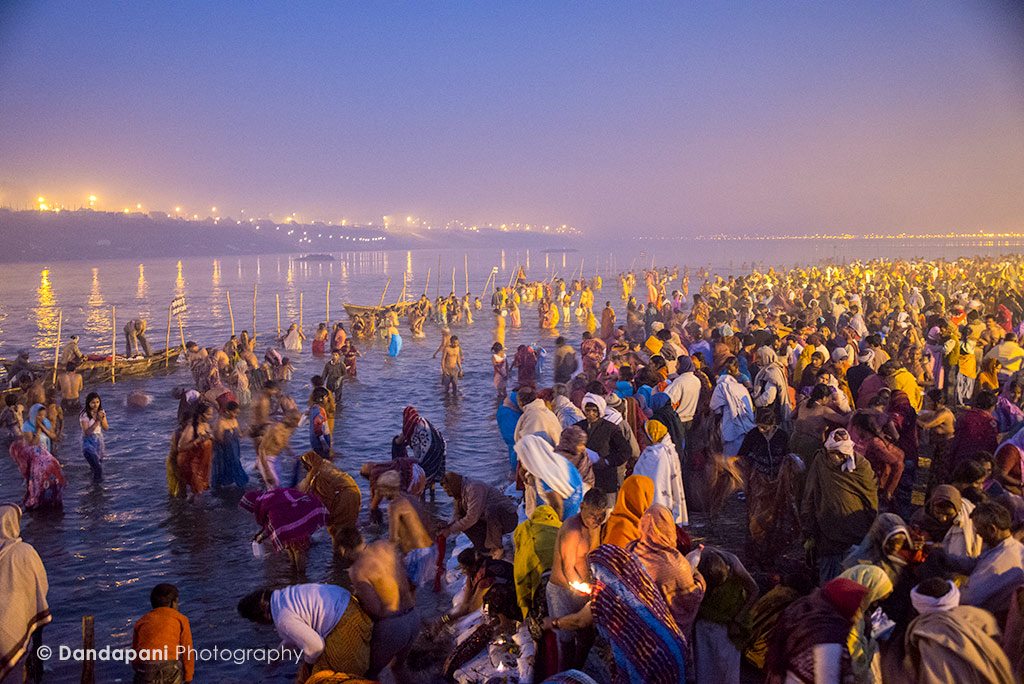Well before dawn, hundreds of thousands of people make their way into the cold waters of the Ganges river. 
