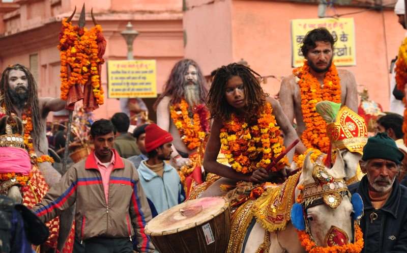 Sadhus arrive on elephant, horses and foot to attend the Kumbha Mela.