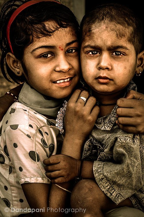 Rajasthan children hugging each other, India