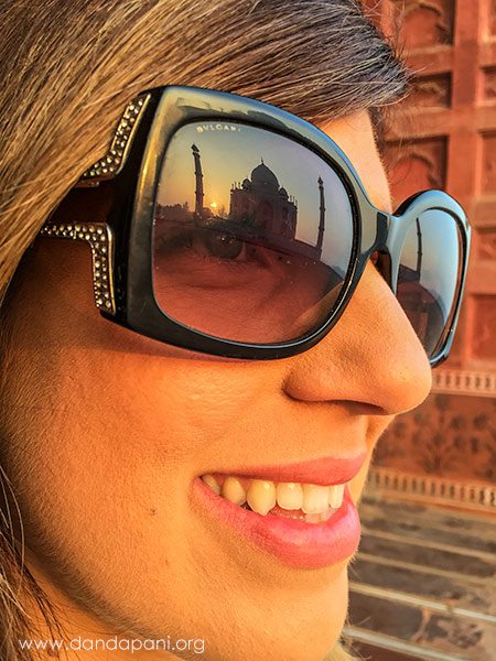 The Taj Mahal reflected in Sonya's glasses...another one of the guide's "recommended" photos.