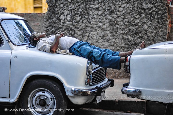 taxi-driver-sleeping-kolkata-india
