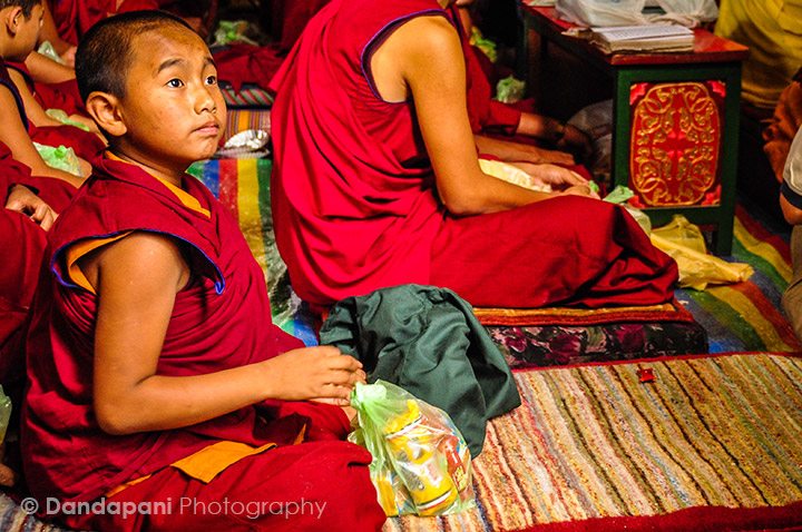 A young Buddhist monk at a monastery in Kathmandu, Nepal.